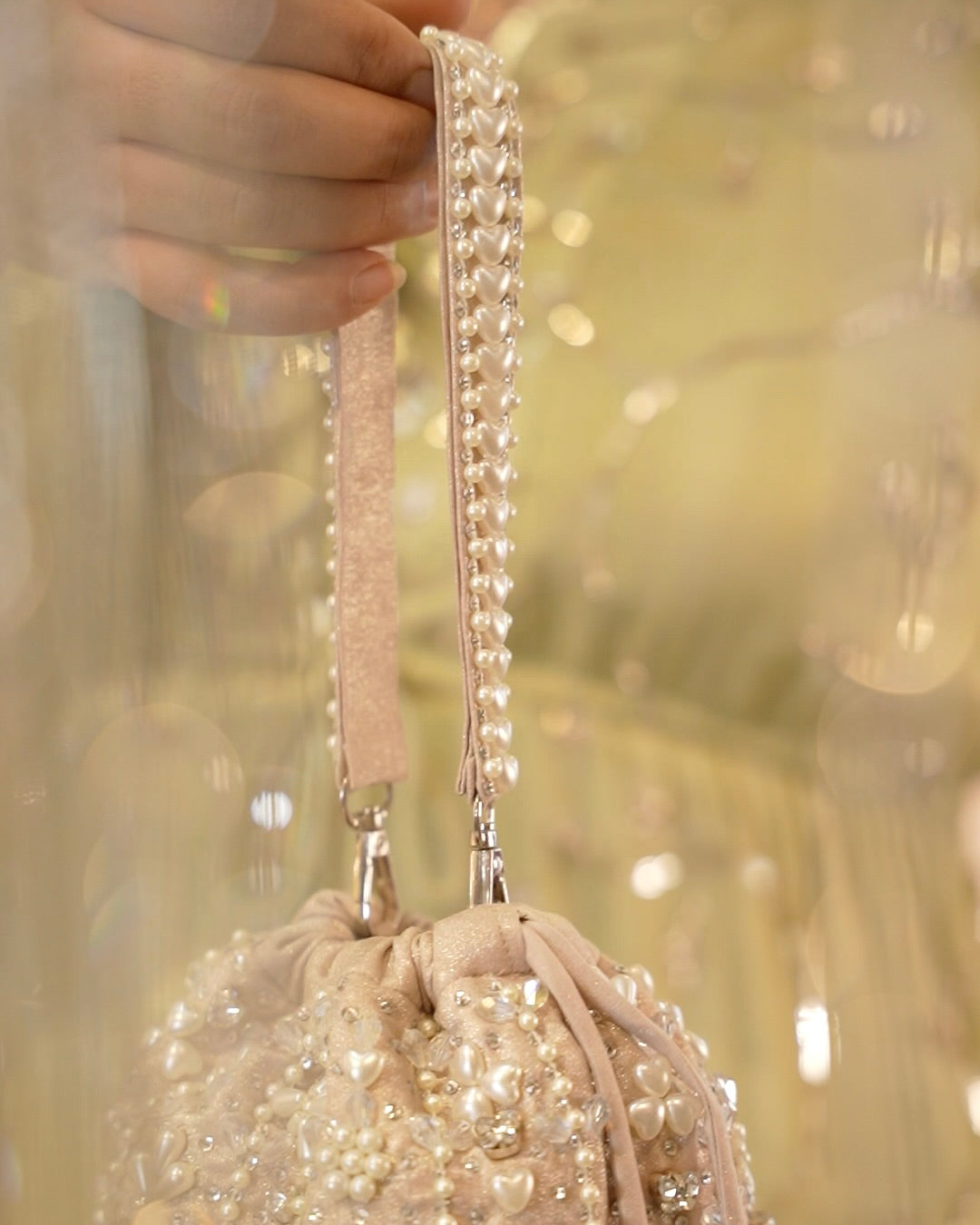 Giva Pearl and crystal lines bucket bag