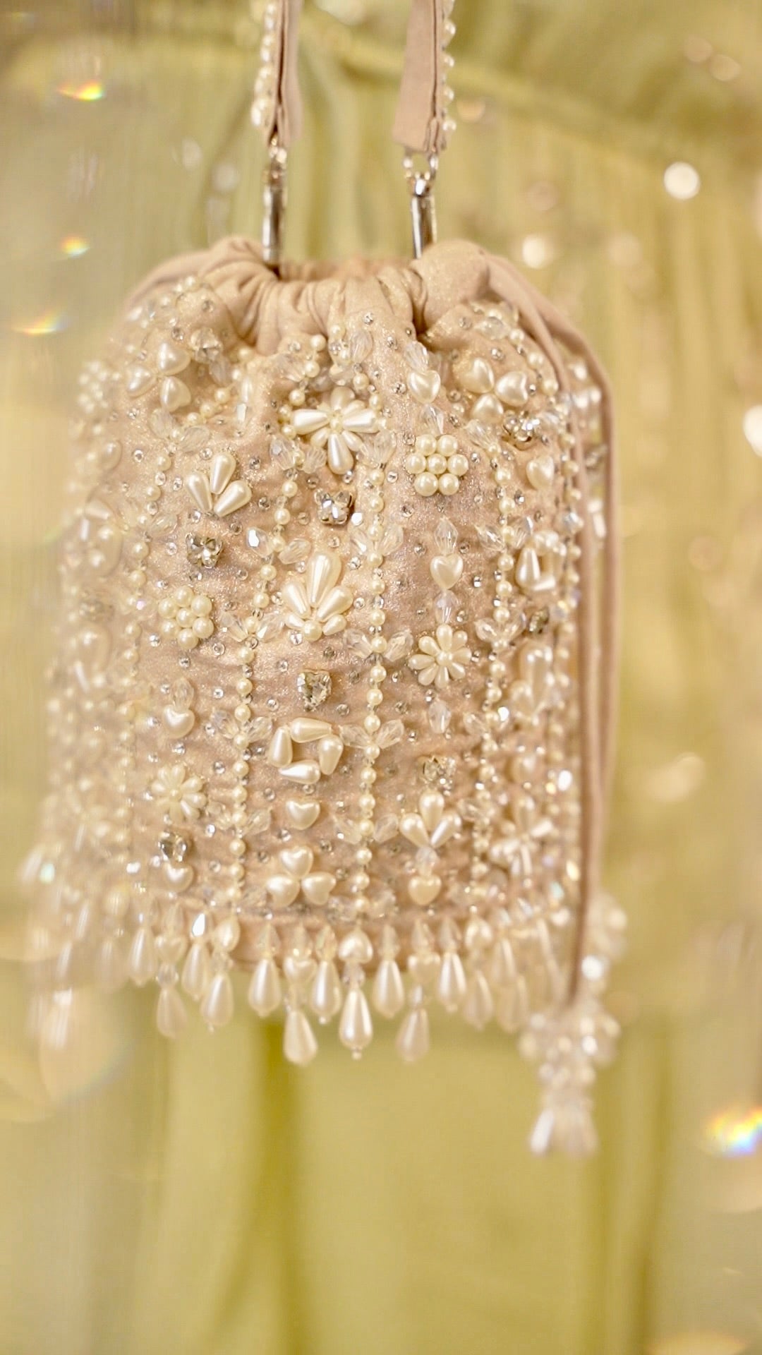 Giva Pearl and crystal lines bucket bag