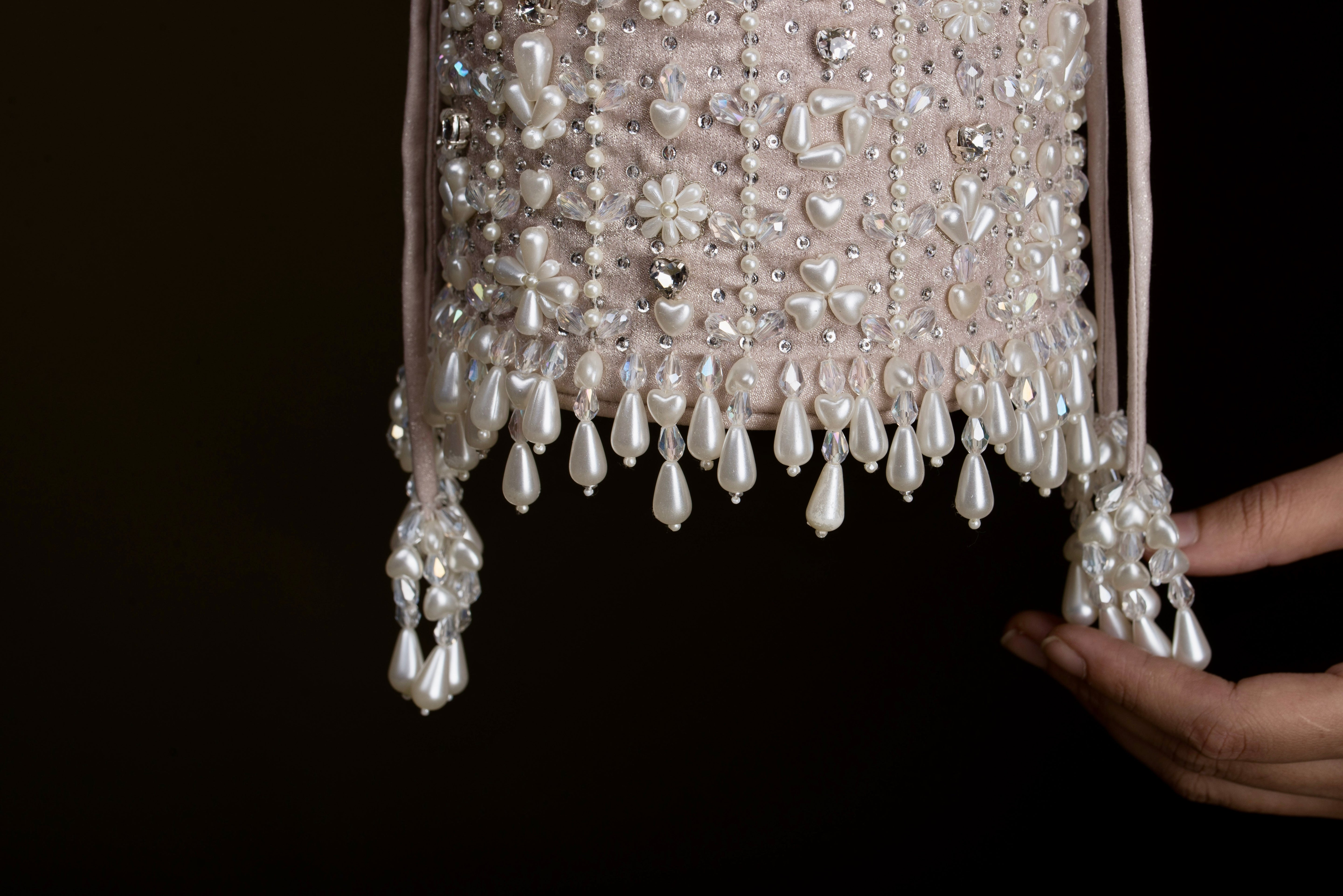 Giva Pearl and crystal lines bucket bag