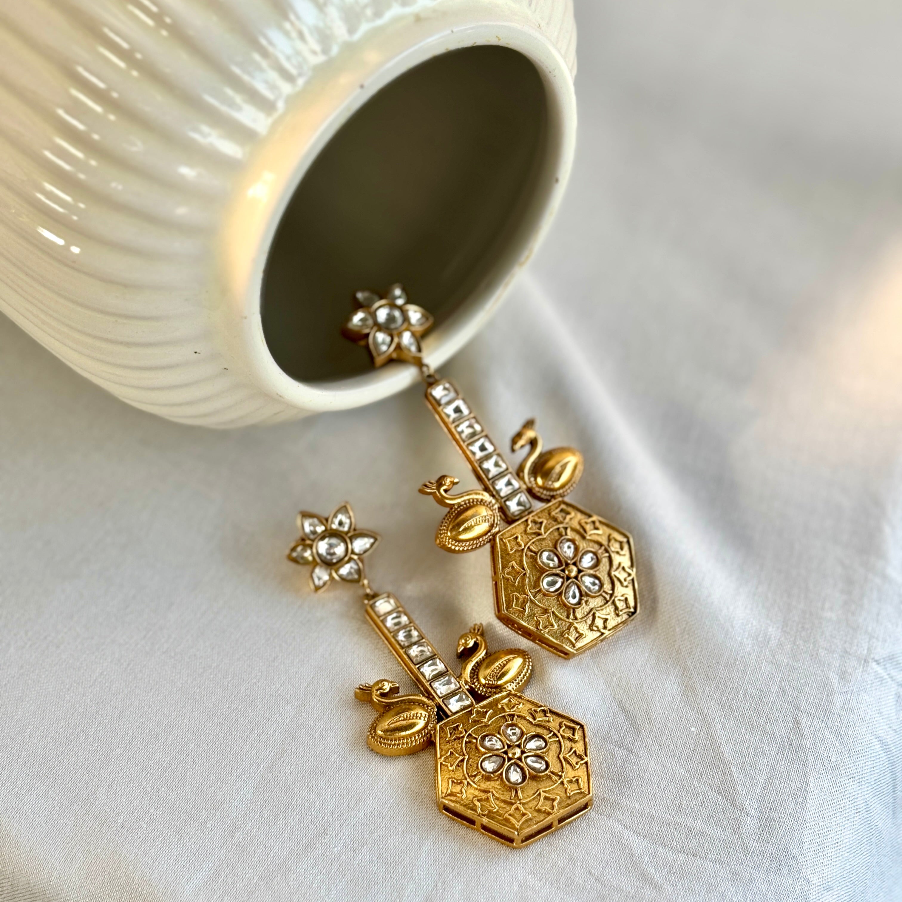 Temple carved earrings