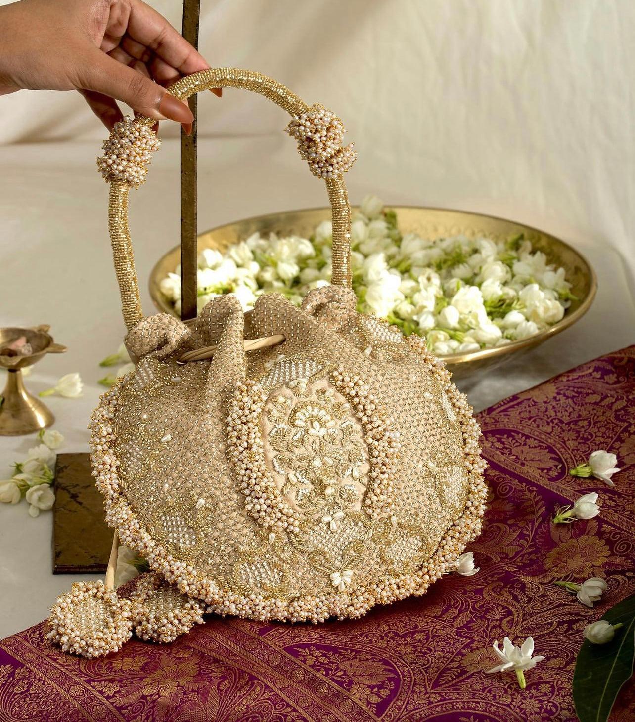 Suhani gold embroidered Potli bag - Ozel