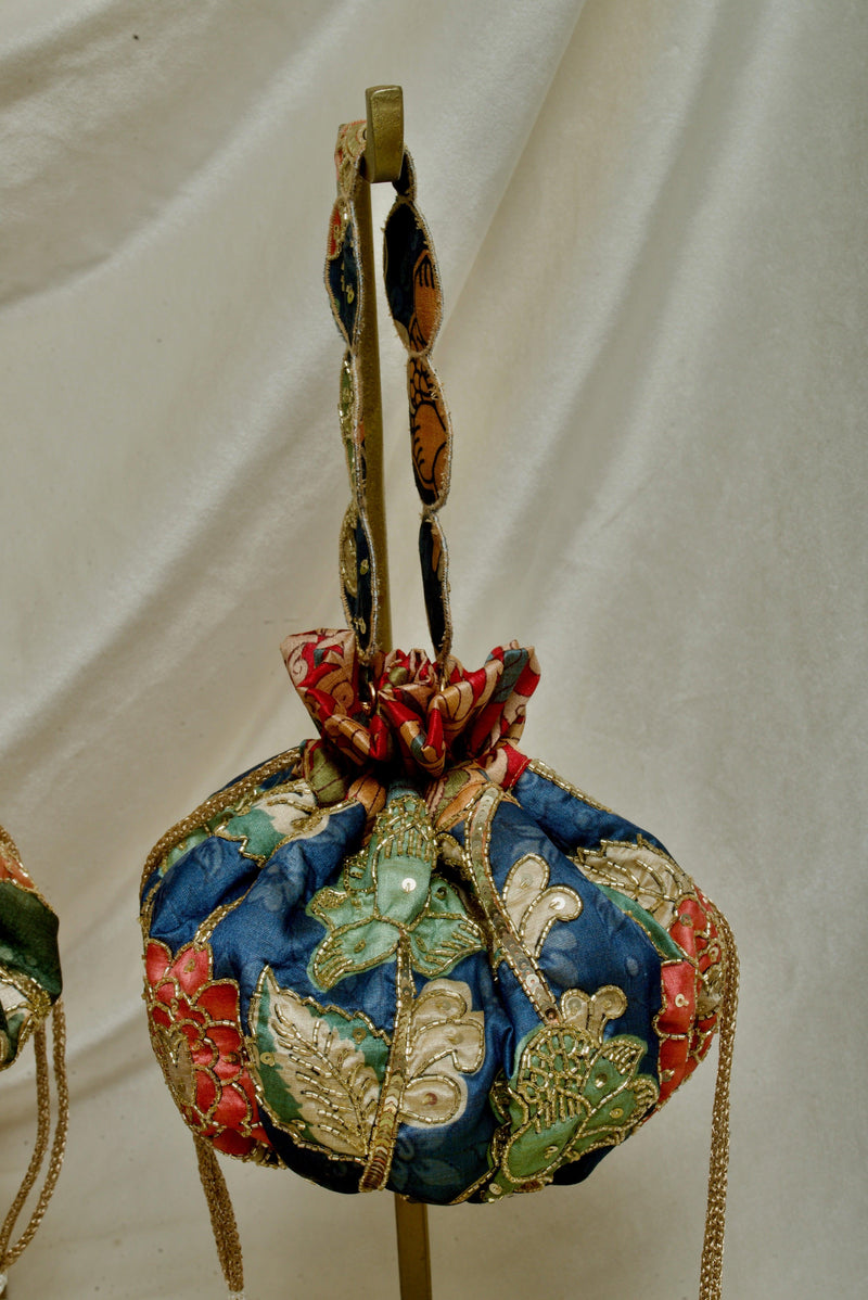 Kalamkari print embroidered gol potli bag