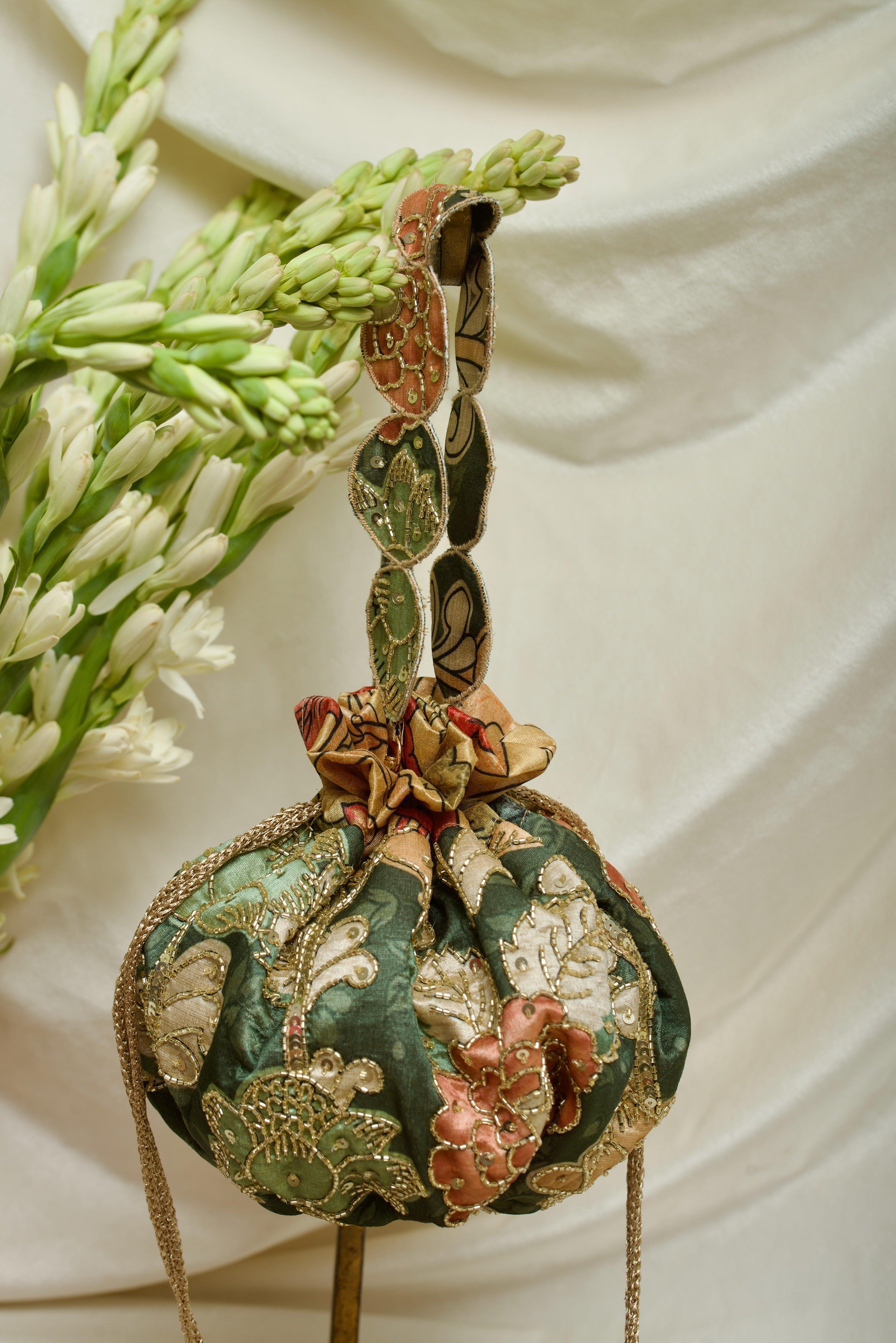 Kalamkari print embroidered gol potli bag - Ozel