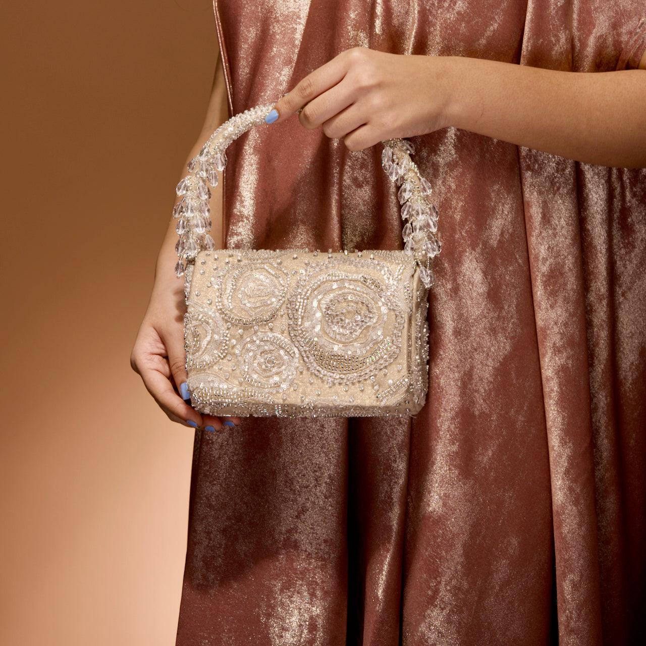 Floral embroidered flap bag