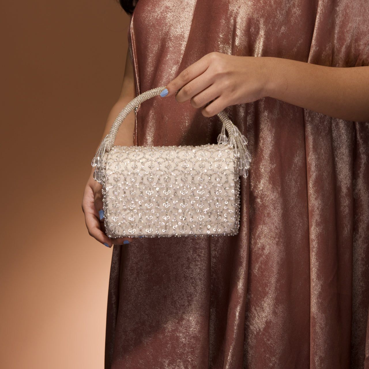 Gold and silver flap bag
