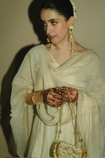 Sanya Malhotra with Amra Beige Hasli Bag