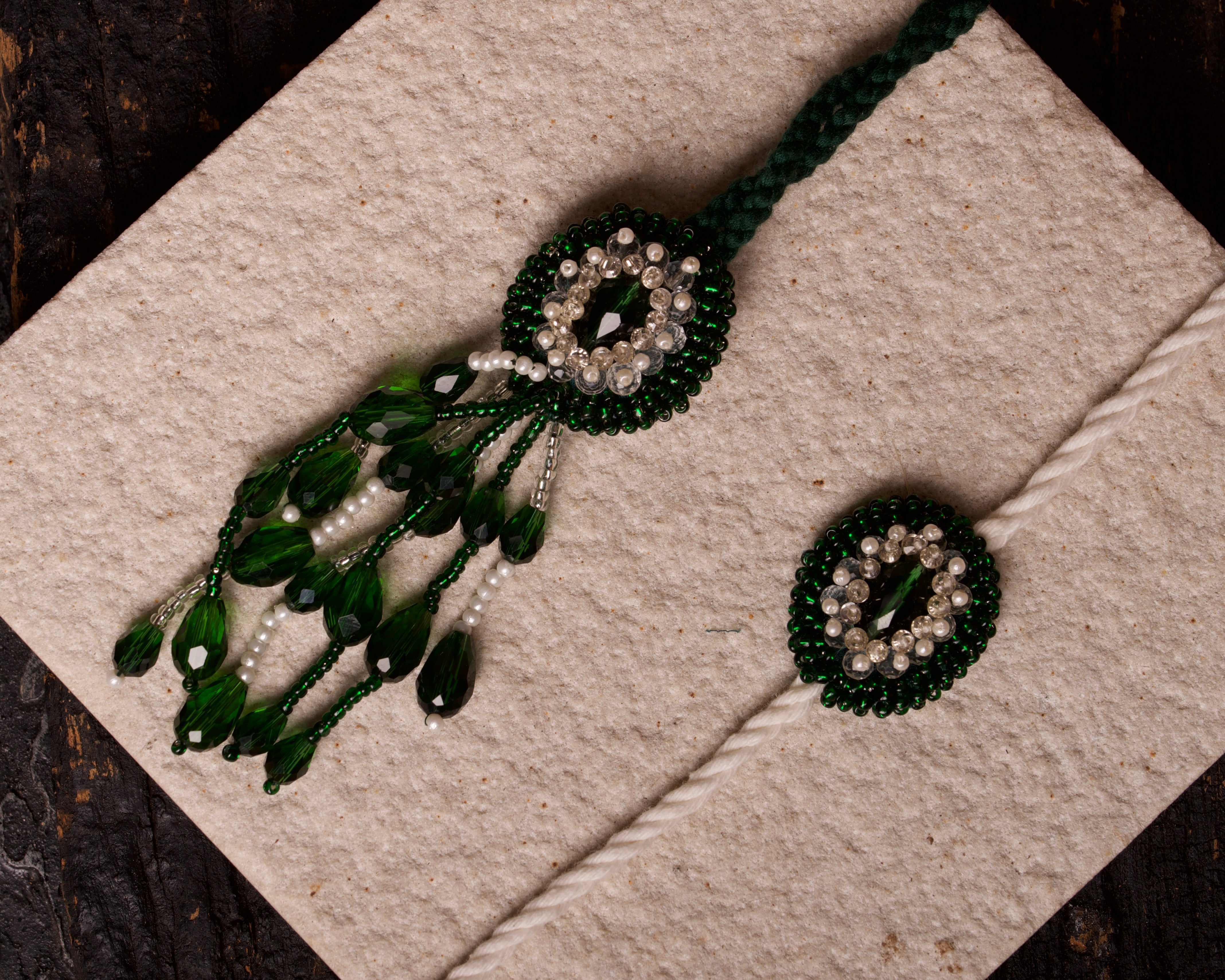 Anshuman Emerald Pearl and Stone Green Rakhi Lumba