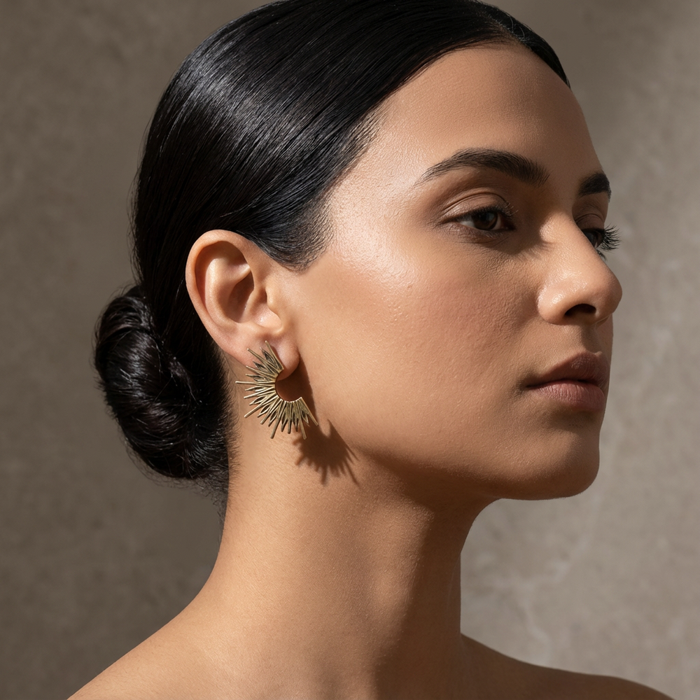 Solar spine hoop earrings – worn on ear by Ozel
