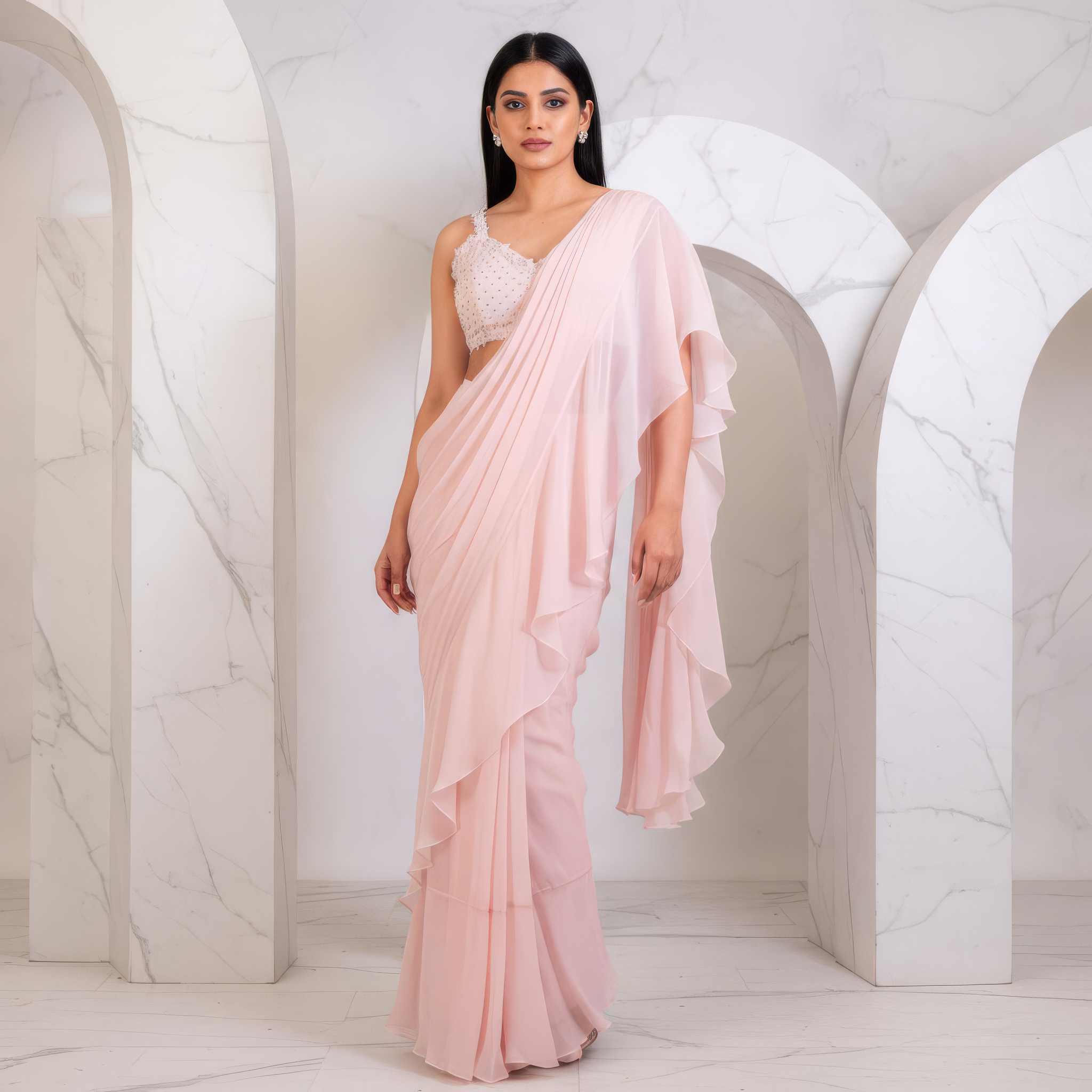Ruffled saree and embroidered blouse