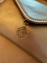 Cactus Leather Gold Envelope bag with 18kt gold and diamonds charm