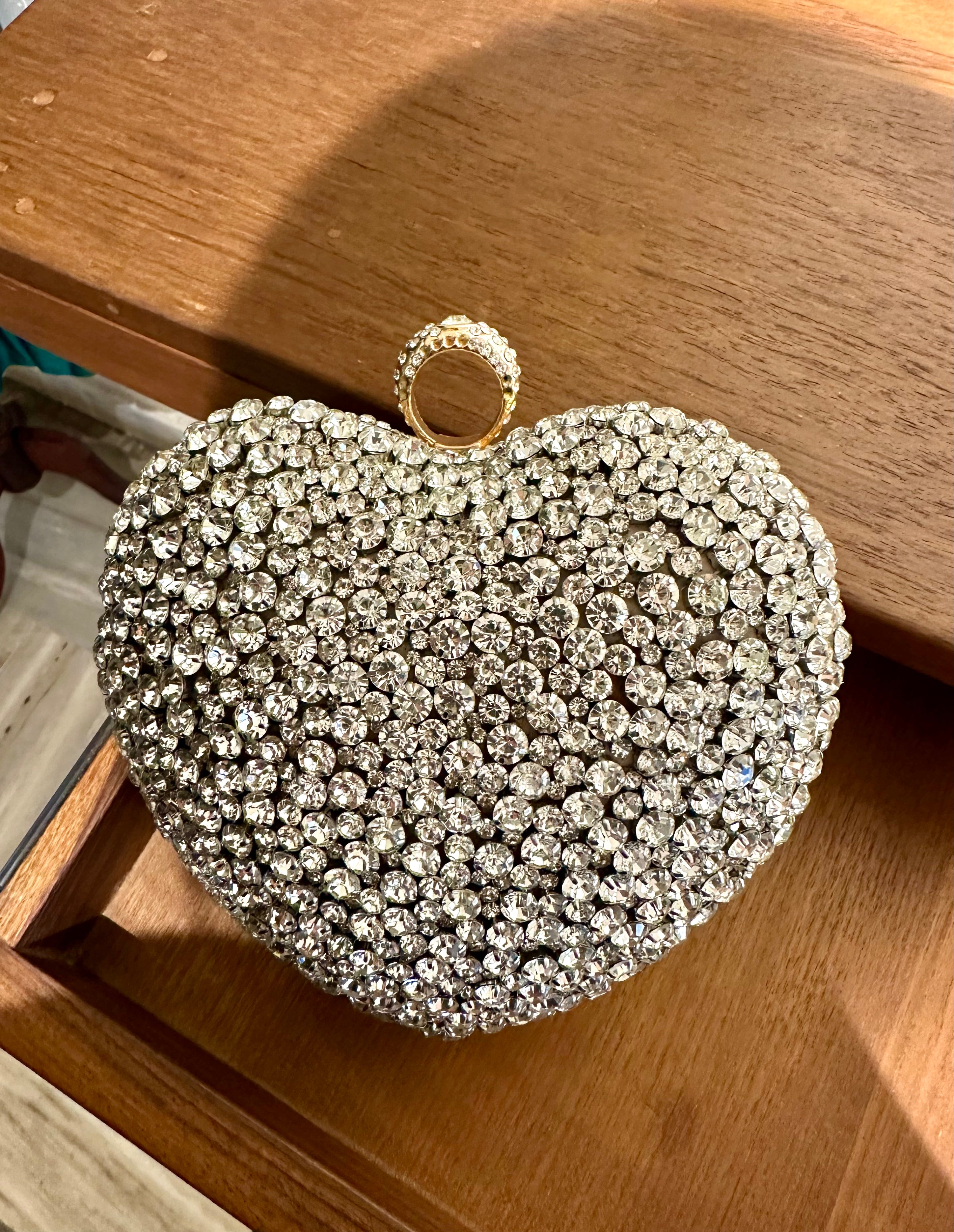 Heart frame clutch bag with chain handle