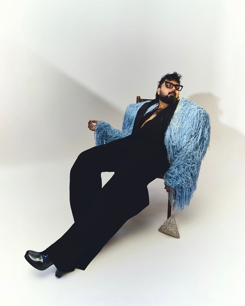 Pranay Jaitly with Gold Silver Pyramid Bag