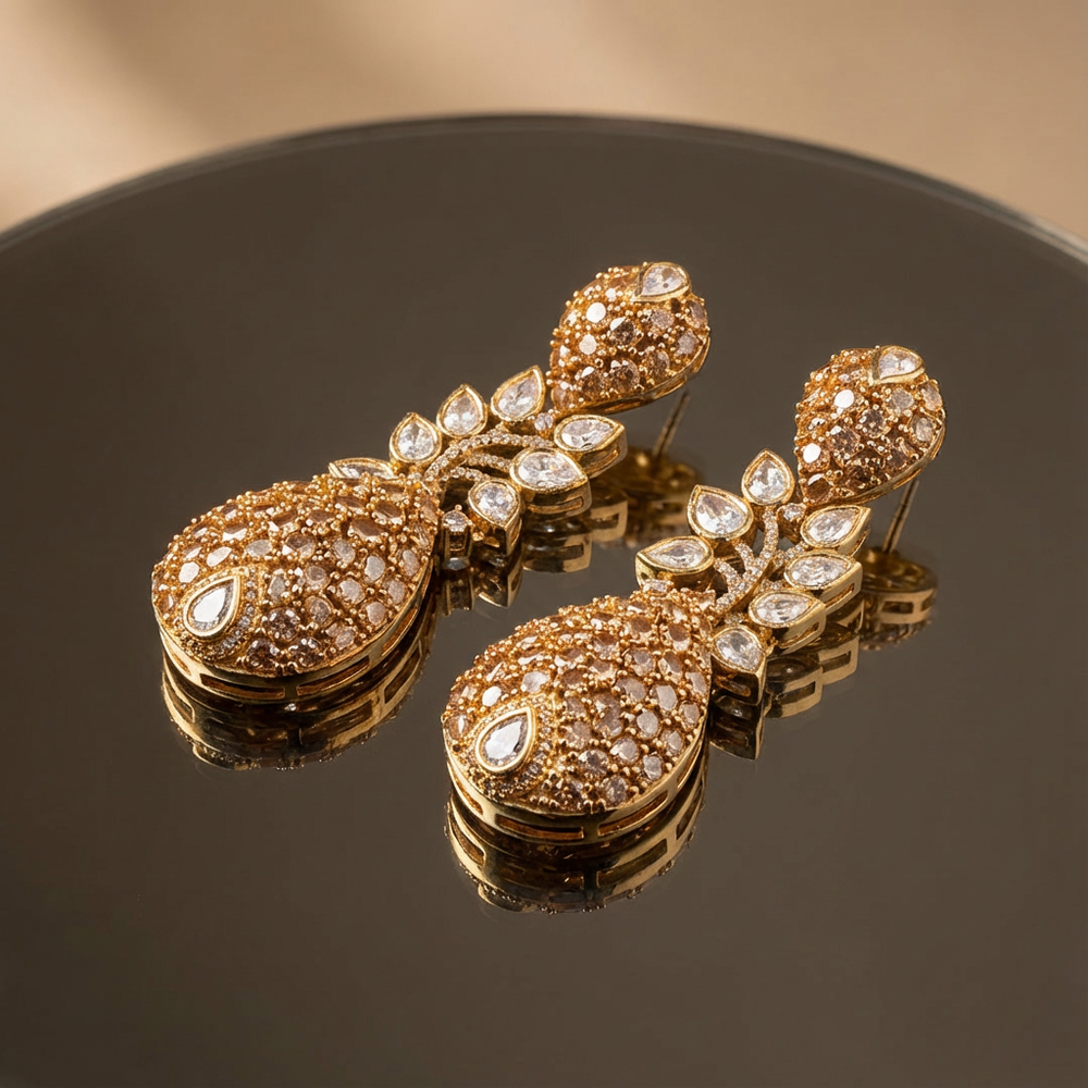 Champagne flare moissanite drop earrings – worn on ear by Ozel