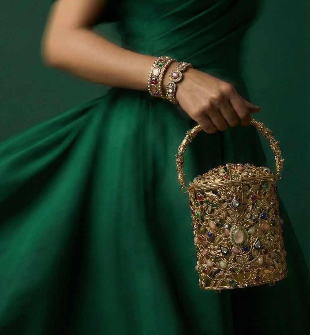 The Ozel Bag — hand-set jewel-toned stones across the gold filigree by Ozel