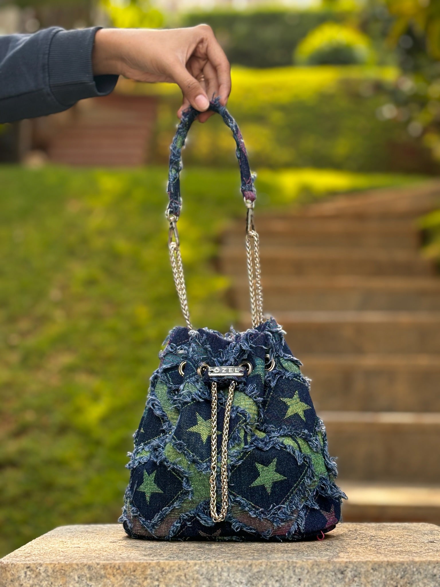 Star denim bucket bag