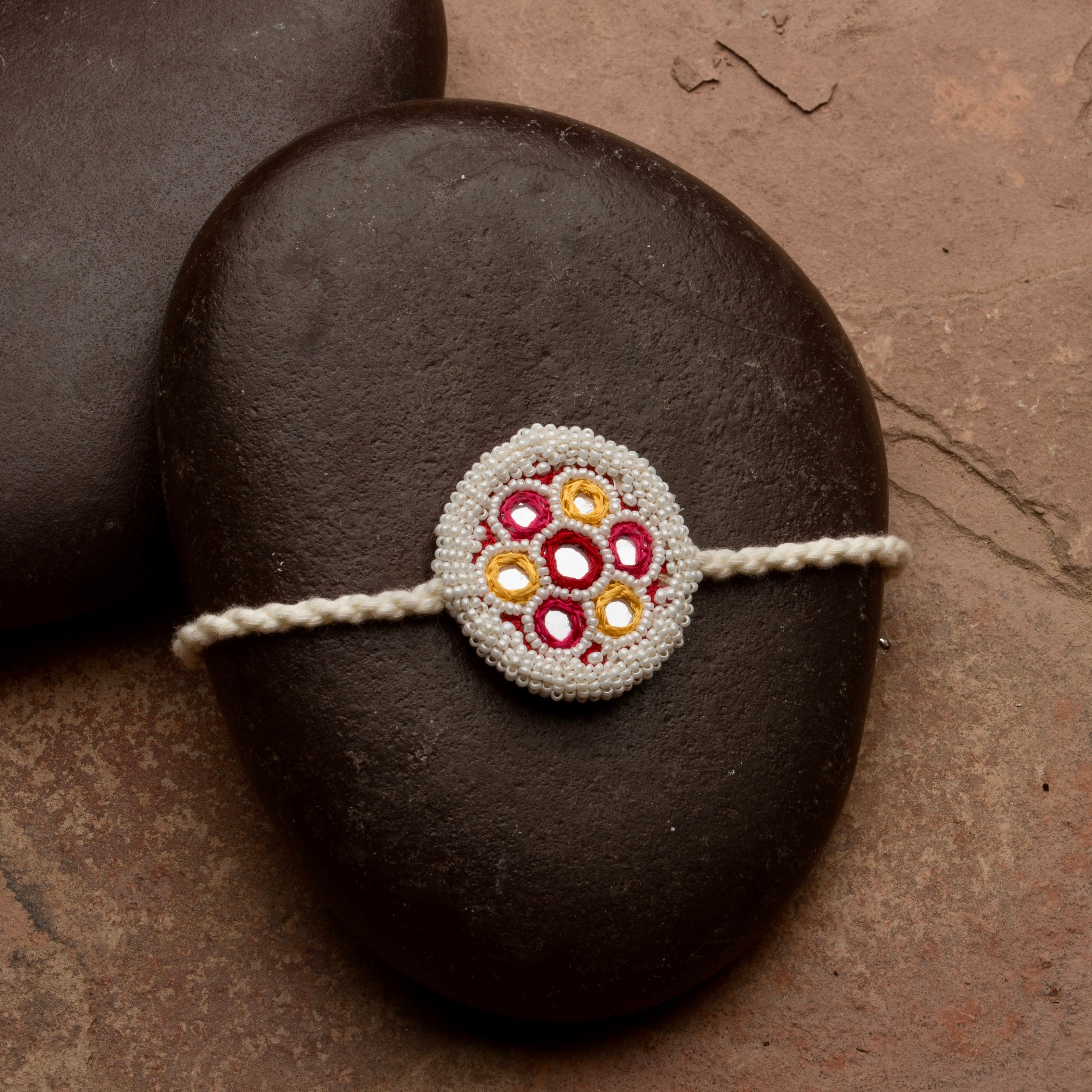 Nishant mirror and pearl rakhi - Ozel