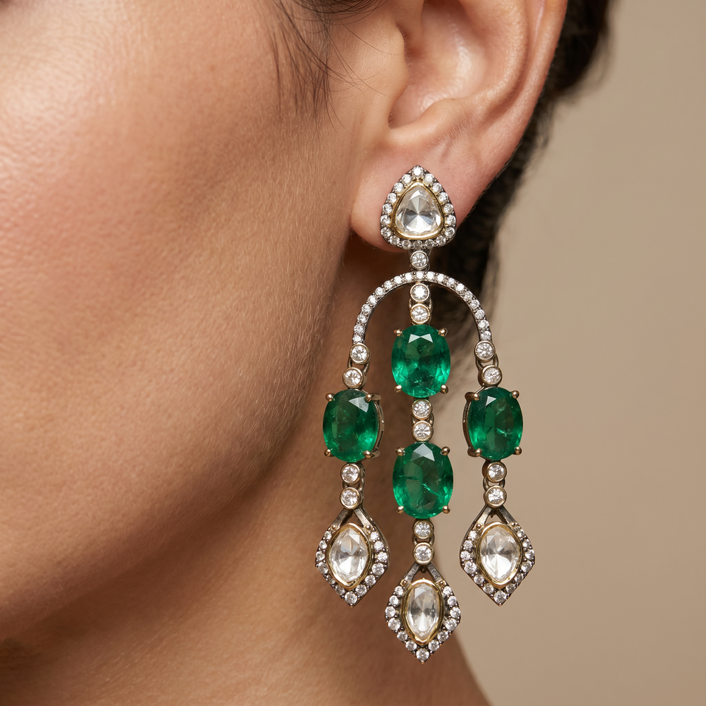 Eshmita Emerald Cascade Earrings with tiered vivid emerald drops and handcrafted gold by Ozel