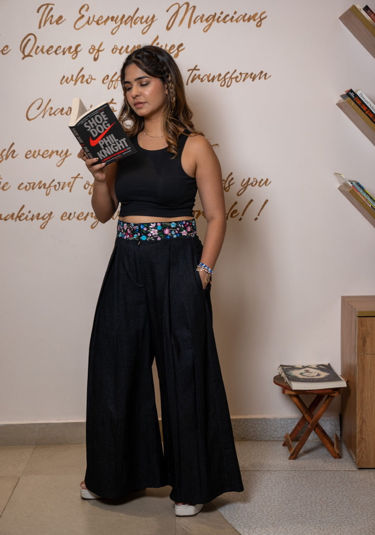 Black denim flare pants with embroidery