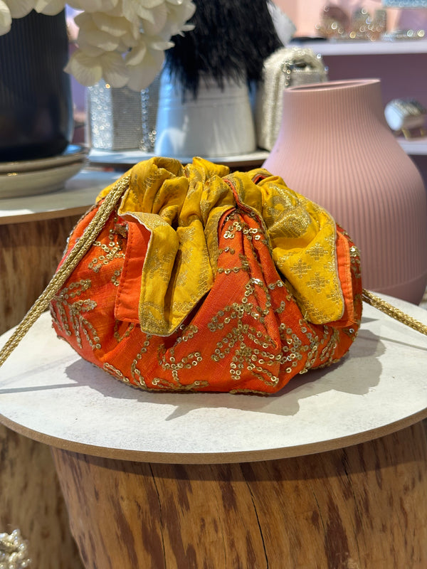 SET OF THREE PRINTED PINK , ORANGE AND GOLDEN POTLIS