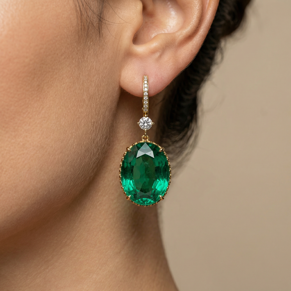 Pranika emerald drop earrings with kundan stones and pearl detail