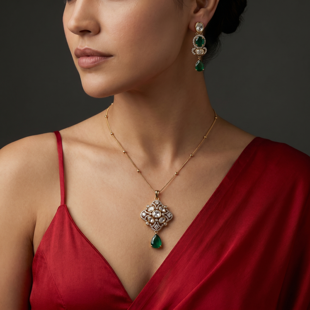 Verisha emerald necklace set with kundan accents and pearl droplets