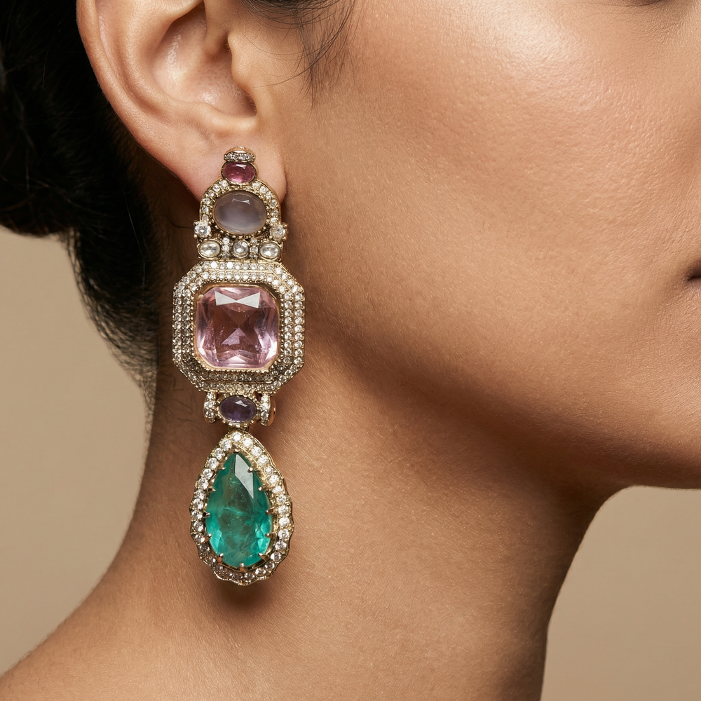Avyra multi-stone drop earrings – worn on ear by Ozel