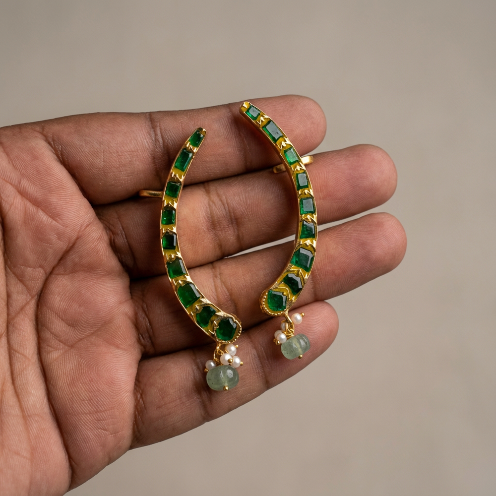 The emerald arc ear cuff – worn on ear by Ozel