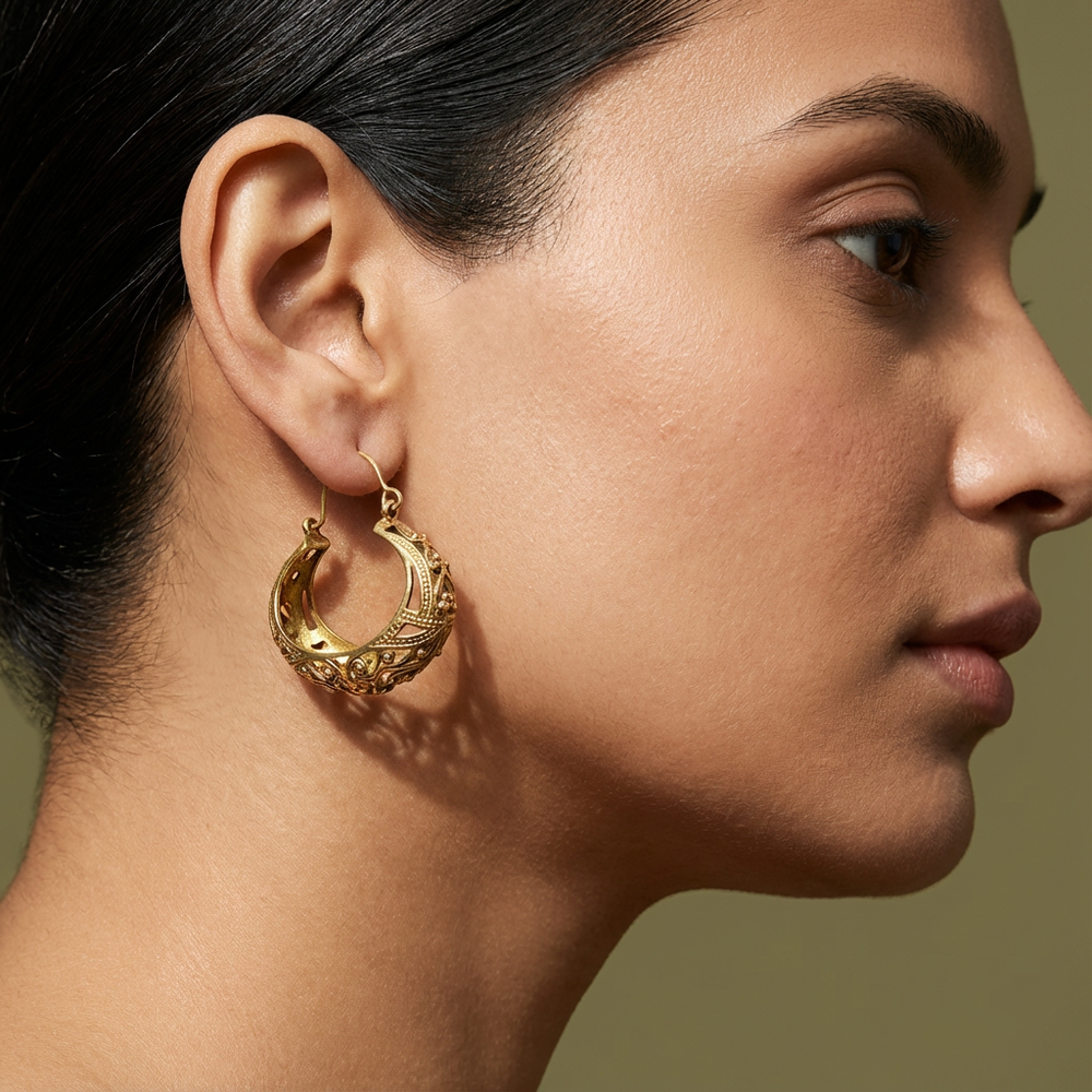 Jali crescent hoop earrings – worn on ear by Ozel