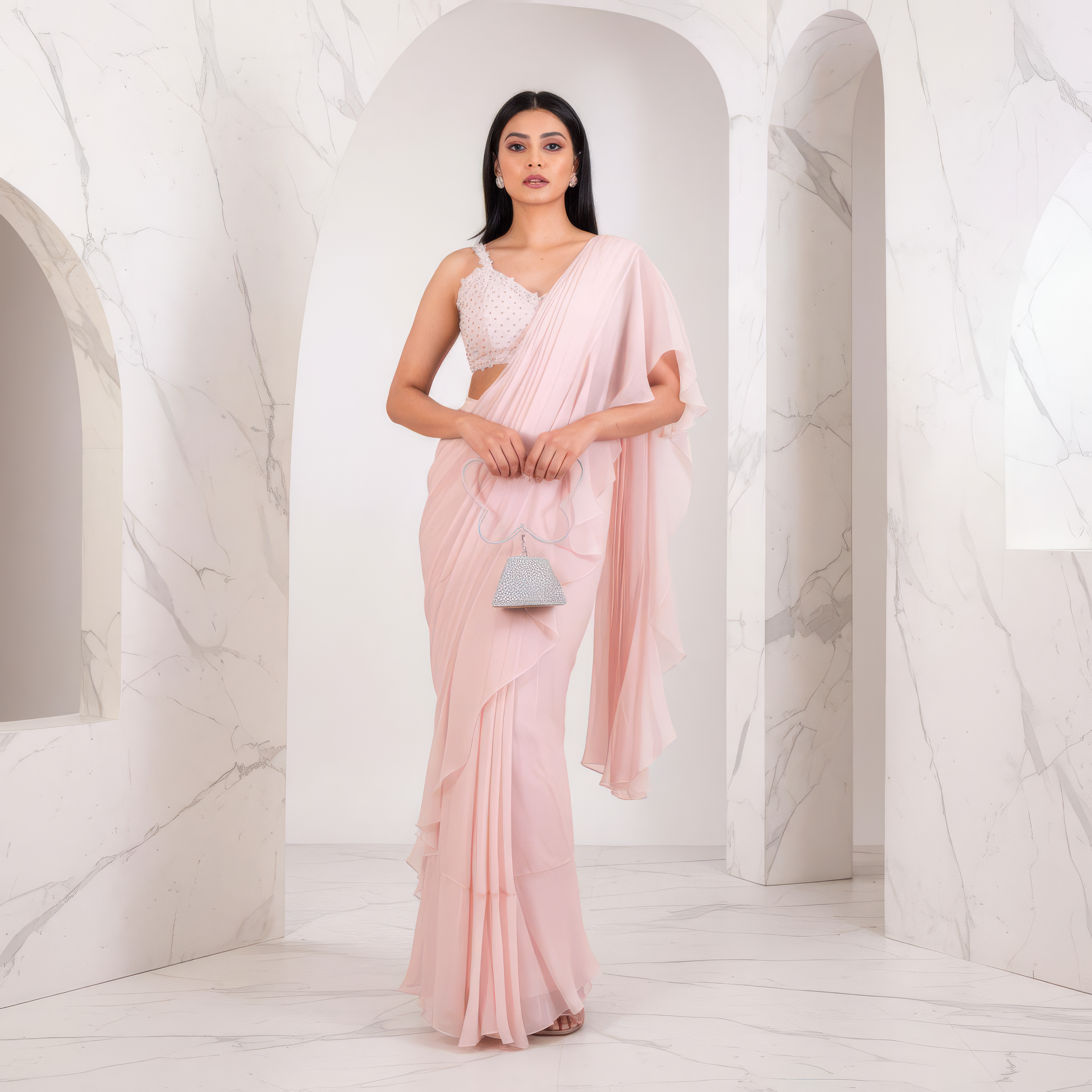 Ruffled saree and embroidered blouse