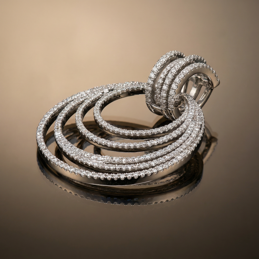Virelia – spiral luxe hoop earrings by Ozel