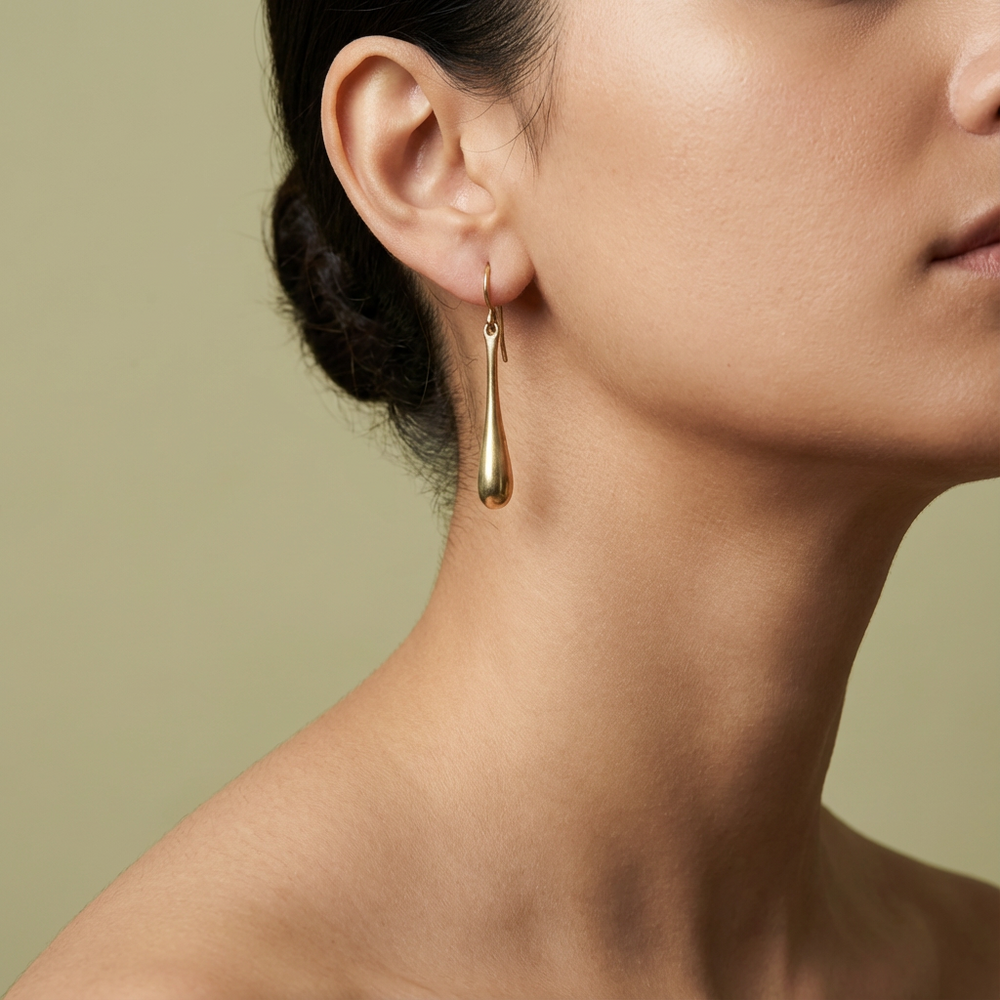 Liquid drop brass earrings – organic flowing brass drop earrings by Ozel