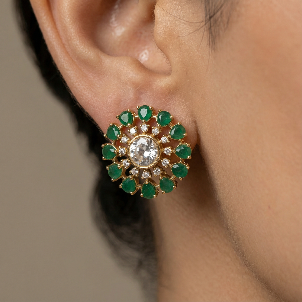 Orbit stud earrings – worn on ear by Ozel