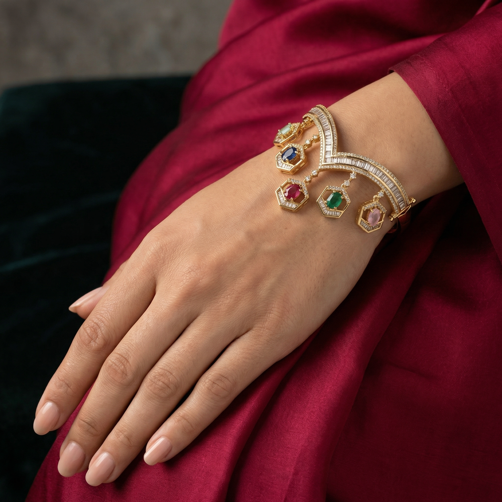 Navratna Prism Bracelet with nine sacred gemstones in a handcrafted gold prism setting by Ozel