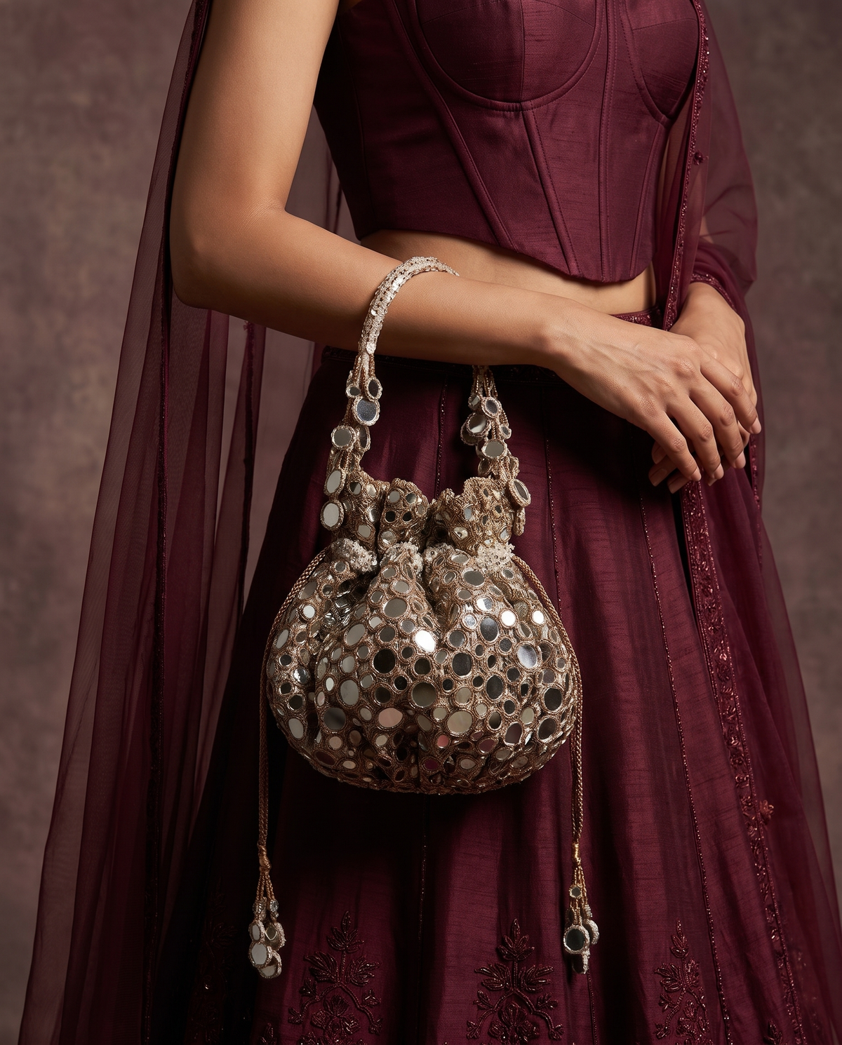 Devyani Mirrorwork Gol Potli Bag