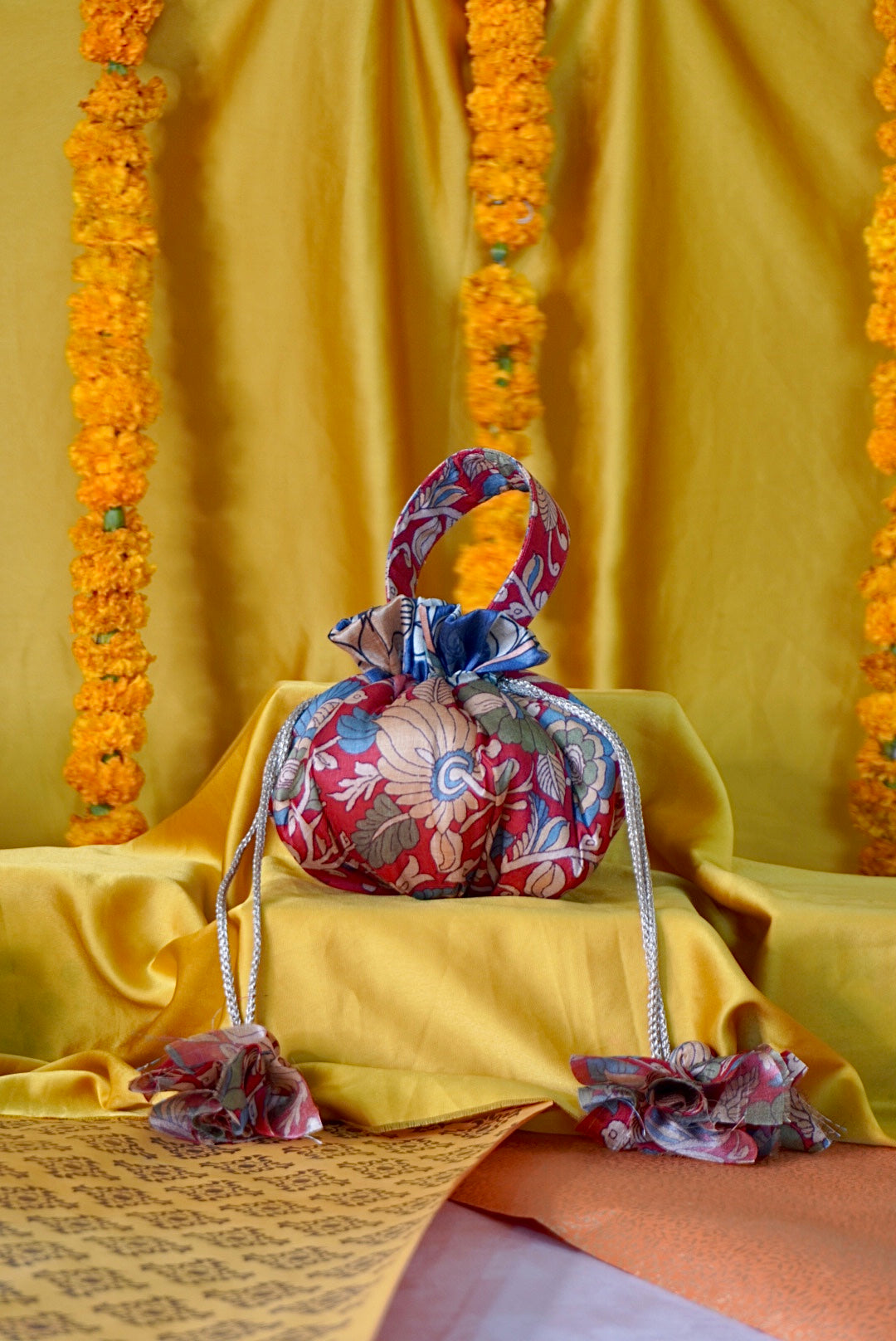 Kalamkari print Gol potli bag