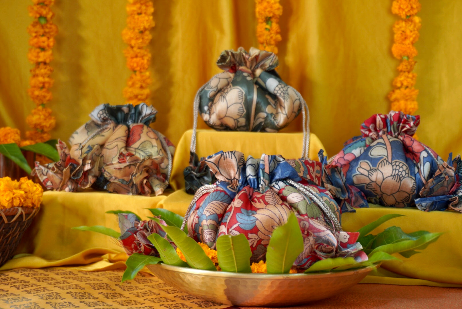 Kalamkari print Gol potli bag