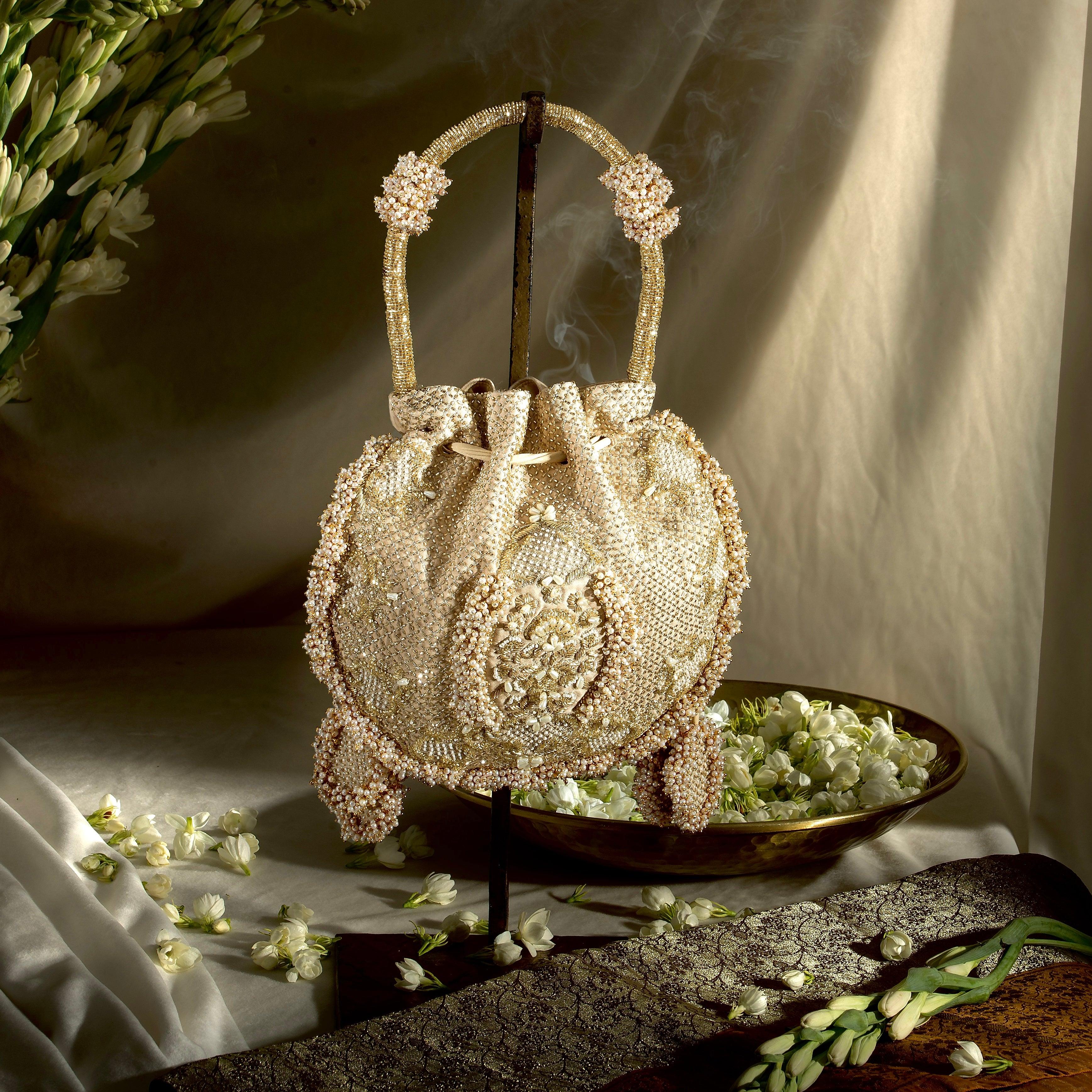 Suhani gold embroidered Potli bag - Ozel