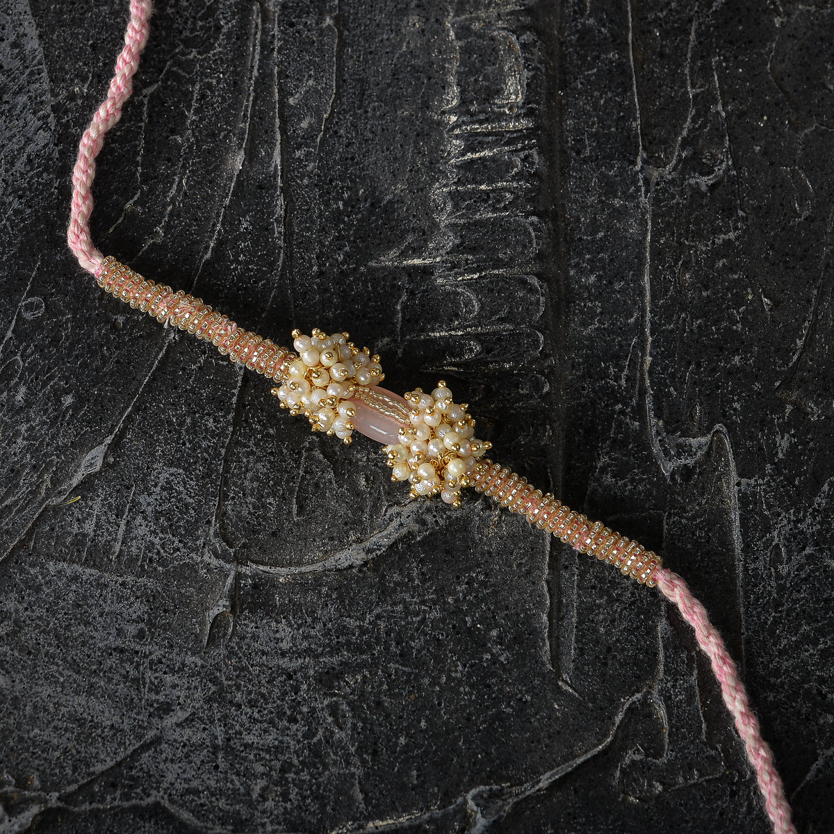 Vishesh Pink Pearl Bunch and Stone Rakhi Lumba