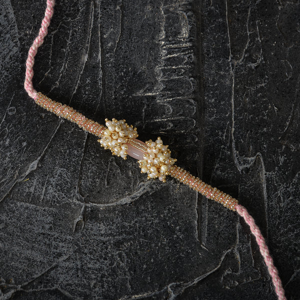 Vishesh Pink Pearl Bunch and Stone Rakhi Lumba