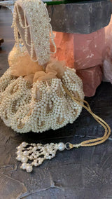 Amor Collection golden Estelle with tassels Potli Bag