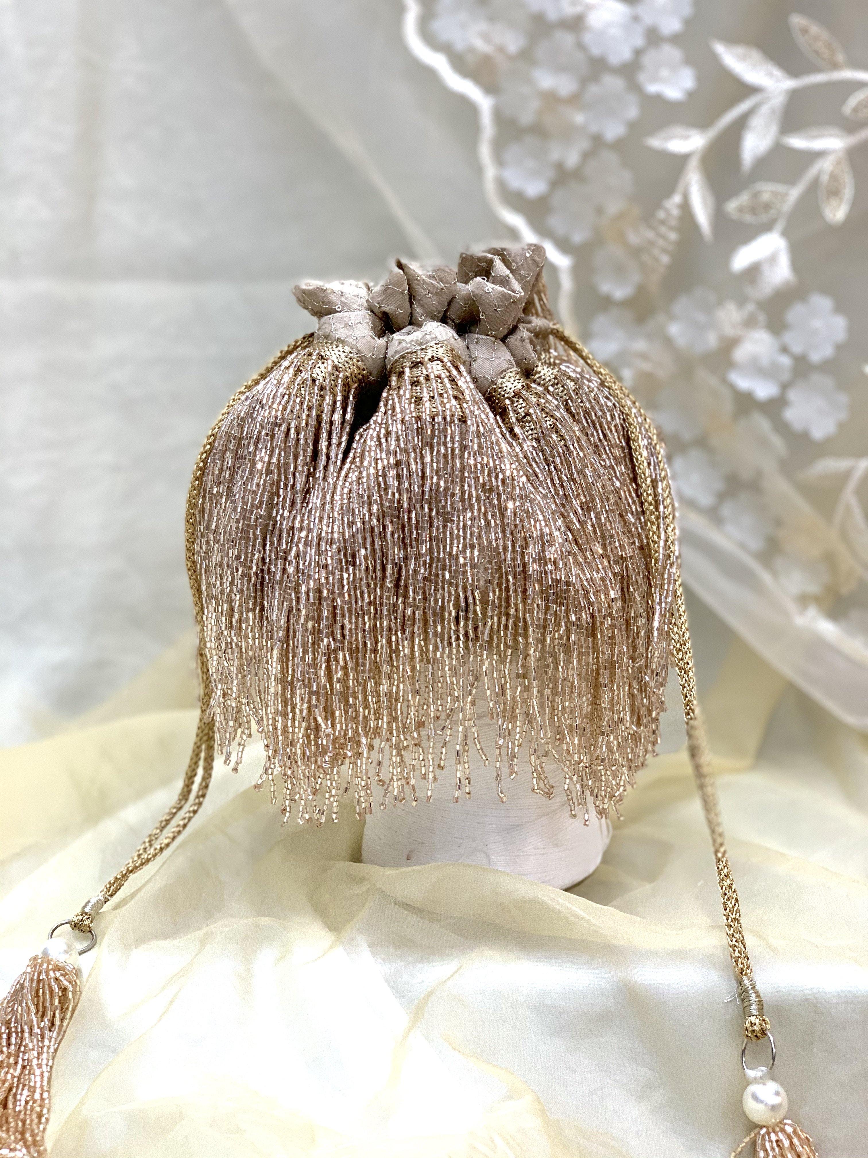 Cleopatra Rose Gold Tassels Potli Bag - Ozel