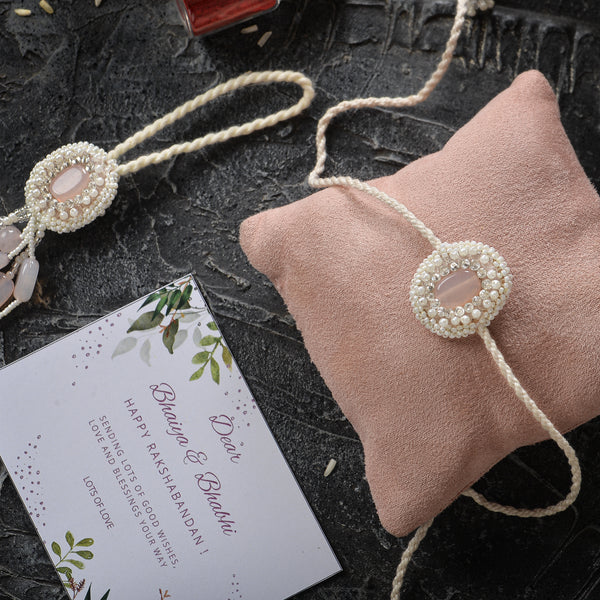 Anshuman White and Pink Pearl and Stone Rakhi Lumba