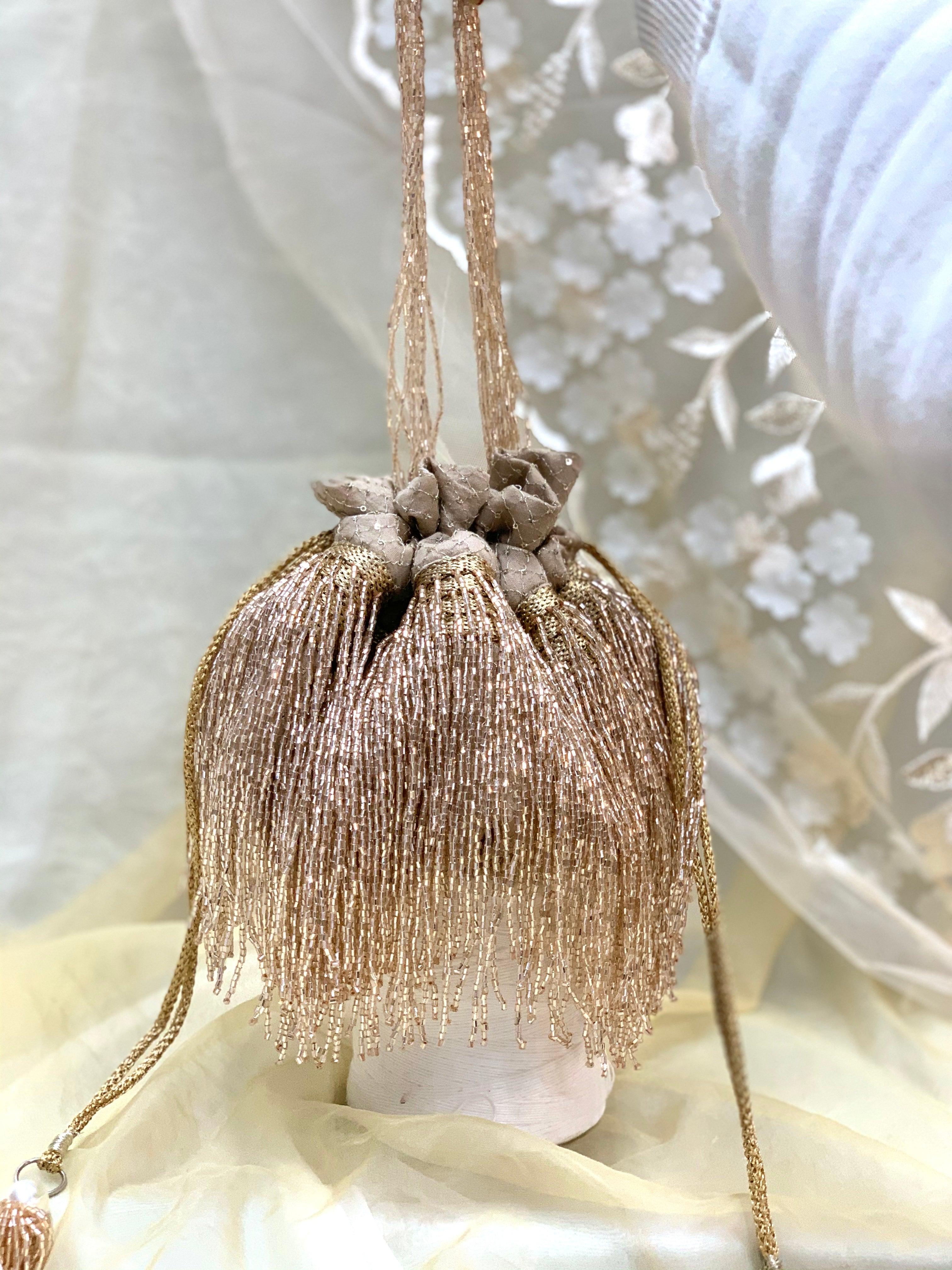 Cleopatra Rose Gold Tassels Potli Bag - Ozel