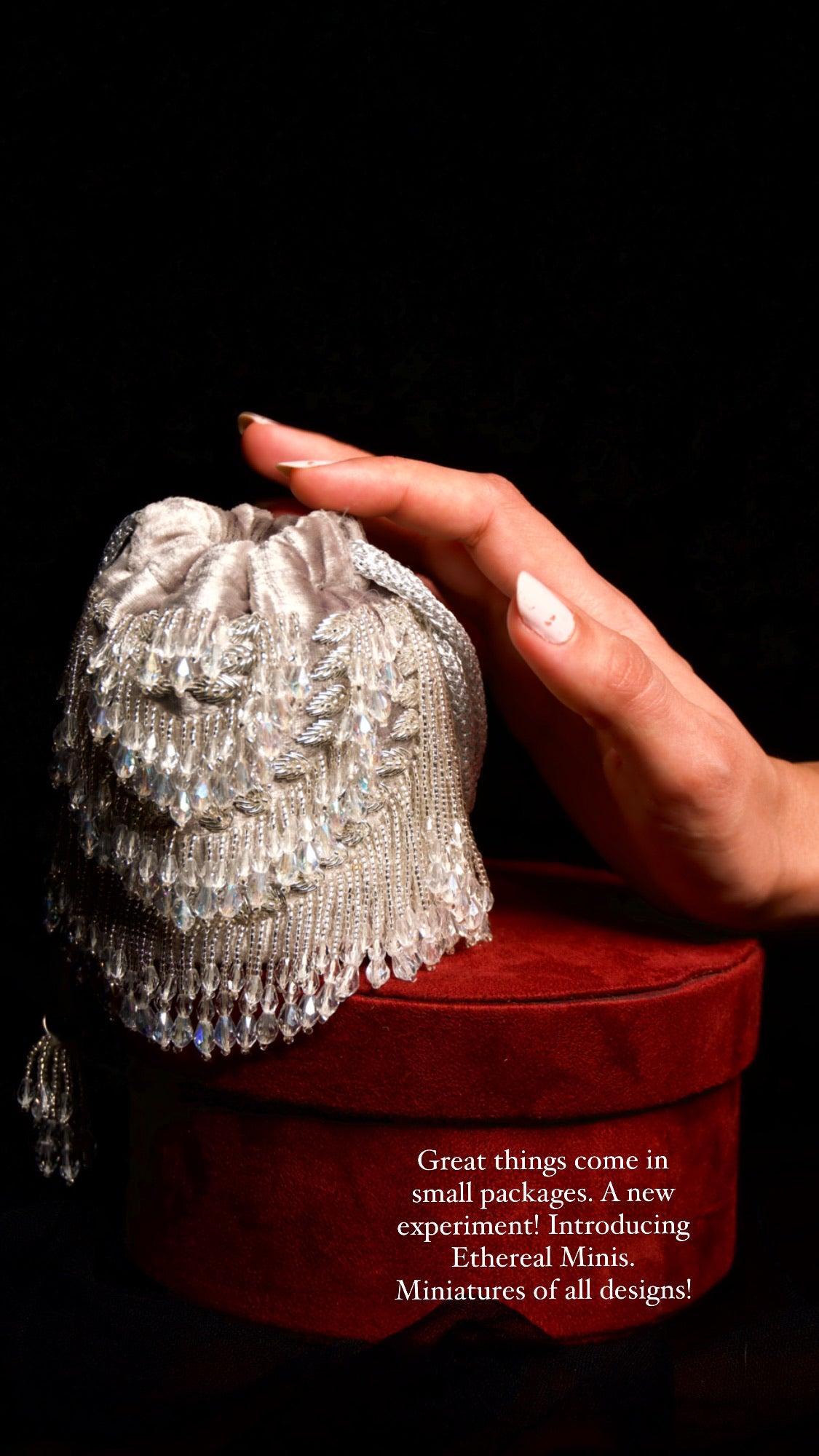 Andromeda Mini Silver Tassels Bucket Bag - Ozel