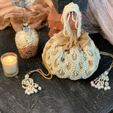 Amor Collection golden Estelle with tassels Potli Bag - Ozel Bir Sey