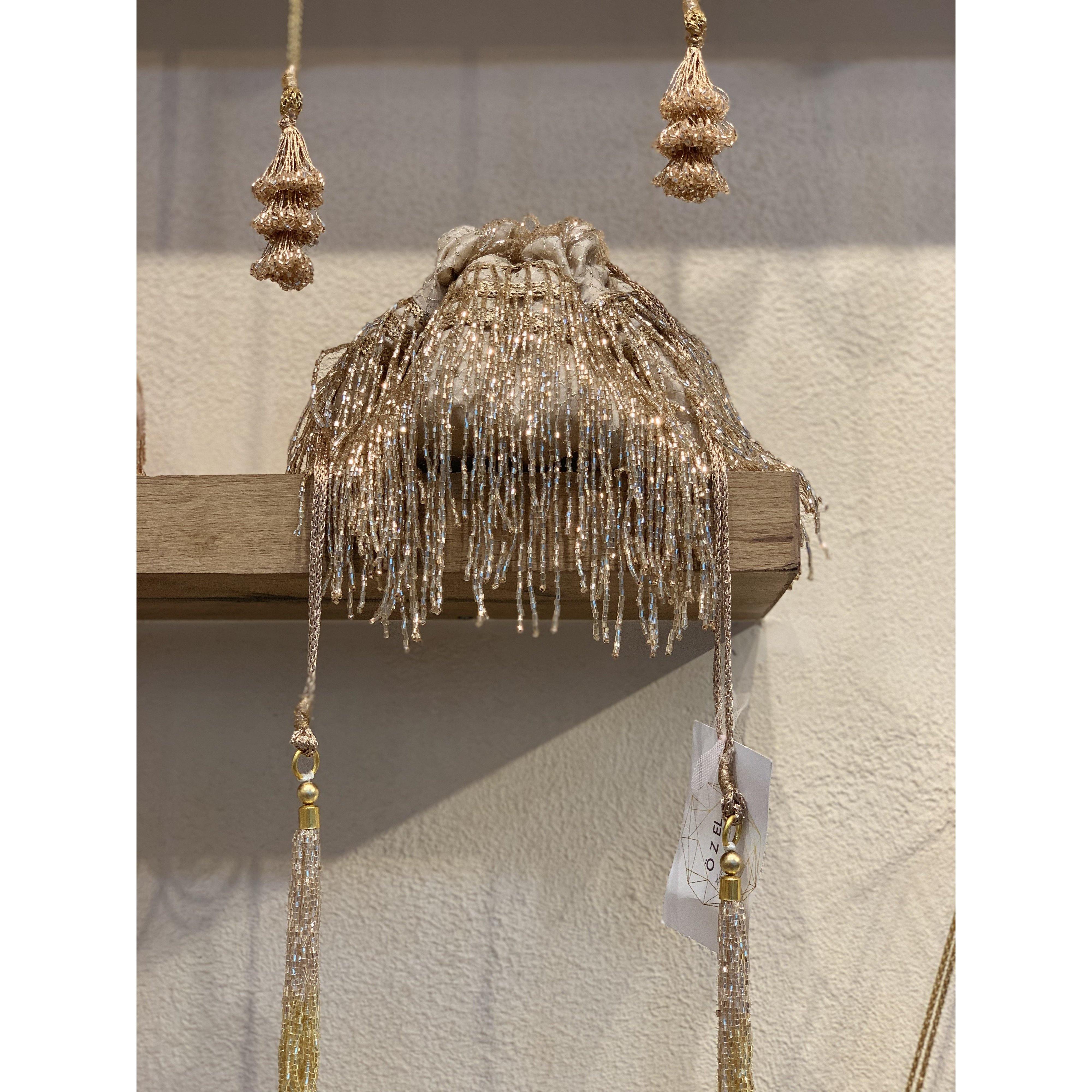 Cleopatra Rose Gold Tassels Potli Bag - Ozel